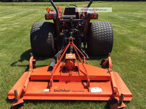 mowing with a skid steer|finish mower for skid steer.